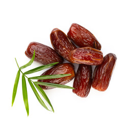 Dry dates isolated on white background. Top view. Flat lay pattern.