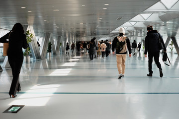 Commuters rushing to work during peak hours