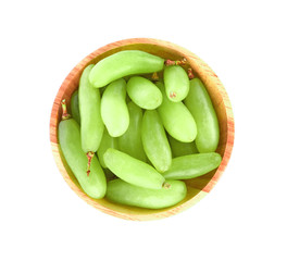 Green grapes in bowl on white background