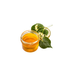 A small glass jar with honey and fresh flowers linden on a white background with copy space. Prevention and treatment of flu and colds. Selective focus.