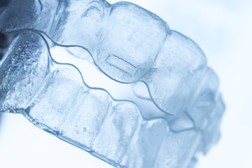 Invisible bracket teeth aligners