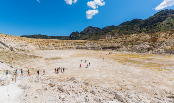the panorama view at the  hydrothermal crater of the sleeping Stefanos volcano is covered with white and yellow sulfur crystals on the island of Nisyros in Greece