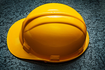yellow helmet on black background