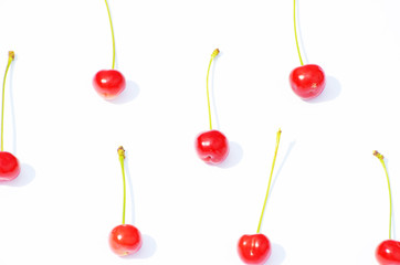 Red cherries isolated on white background, fruit pattern,photo