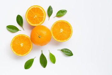Fresh orange citrus fruit with leaves isolated on white background.