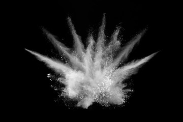 White powder explosion on black background. Colored cloud. Colorful dust explode. Paint Holi.