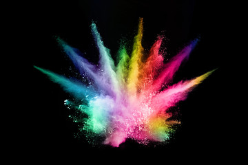 abstract colored dust explosion on a black background.abstract powder splatted background.
