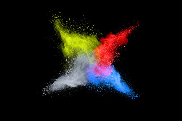 abstract colored dust explosion on a black background.abstract powder splatted background.