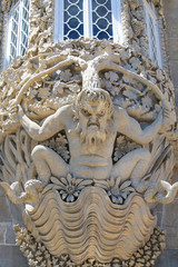 Fototapeta na wymiar Gargoyle in entrance of Palacio de Pena - Sintra, Portugal