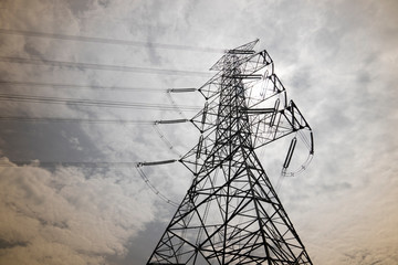 High power poles under the sky and cloud.