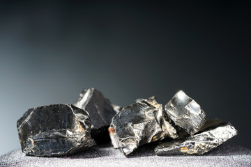 Shungit is a black rock that consists mainly of carbon and was photographed in top quality and studio quality.