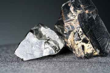 Shungit is a black rock that consists mainly of carbon and was photographed in top quality and studio quality.