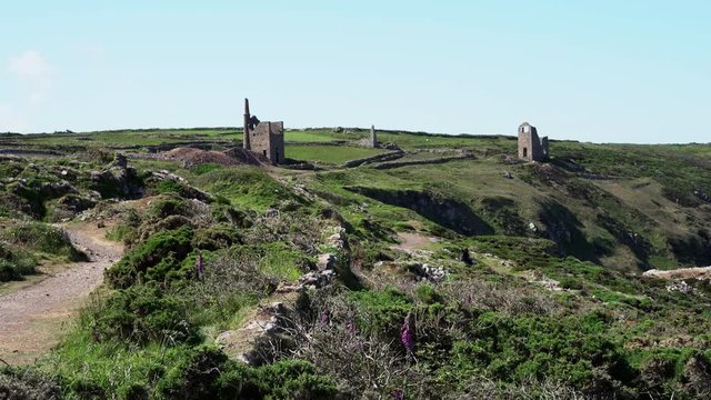 The Poldark famous tin and copper mine location known as wheal leisure. The real name is wheal owles, a world heritage site in the cornish countryside close to beautiful cliffs. Zoom in 4k footage