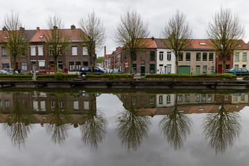 Fototapeta na wymiar Cozy streets and beautiful architecture of Rainy Brugge, Belgium