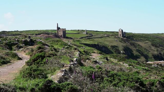 The Poldark famous tin and copper mine location known as wheal leisure. The real name is wheal owles, a world heritage site in the cornish countryside close to beautiful cliffs. Zoom out 4k footage