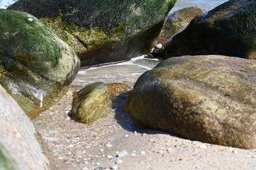 Naklejka na ściany i meble Rocks at the Beach
