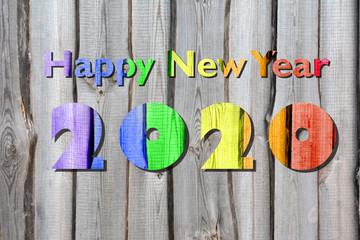 New Year 2020 - rainbow colored wishes. Concept of ecology and tolerance.