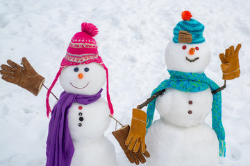 Group of snowman celebrating new year. Snowman couple in love have fun Christmas or New Year. Romantic and love - winter concept. Happy new year snowman friends.