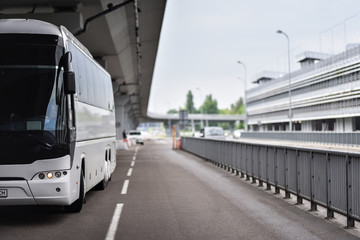 regular bus services in the airport - Powered by Adobe