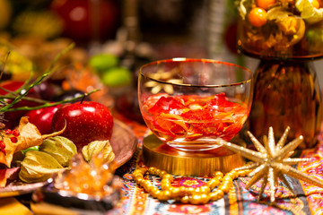 Close Up of Table decorated with Autumn and Winter Fruits and Edibles