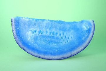 Blue colored watermelon on green isolated background water melon melone fruit