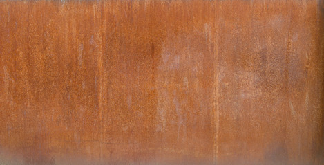 High resolution full frame background of a rusty and weathered old sheet metal plate texture.