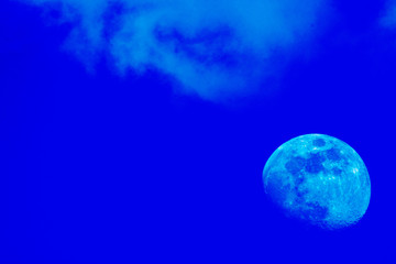 Obraz na płótnie Canvas waxing gibbous moon in a cloudy sky