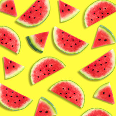 Colorful summer fruit pattern of watermelon slices on a vibrant yellow background