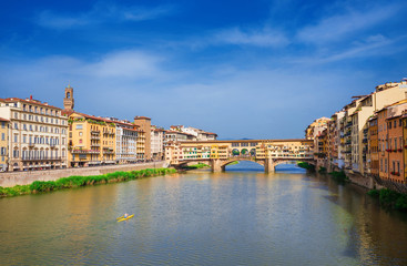 Fototapeta na wymiar View of the famous Ponte Vecchio (Old Bridge) over River Arno in the historic center of Florence
