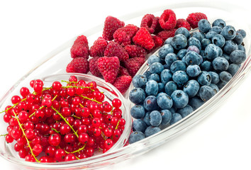 Mix of fresh berries. Raspberry, red currant and blueberries