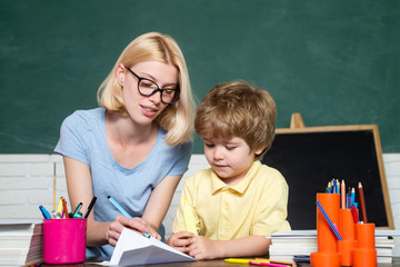 Elementary school - education and learning child concept. First time to school. Happy school kids....