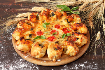 Homemade Pizza Margarita with Tomatoes, Basil and Mozzarella Cheese