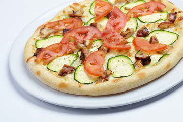 tasty pizza with zucchini on white