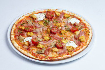tasty pizza with bacon and cherry tomatoes