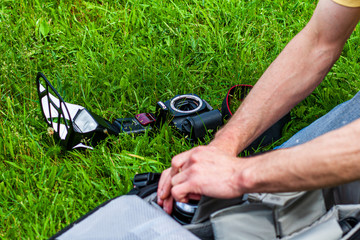 male photographer taking pictures in nature