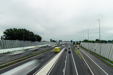 Traffic over the highway, motion blurred traffic, ring east A10, 06/14/2019 Amsterdam the Netherlands, speedway, freeway fast