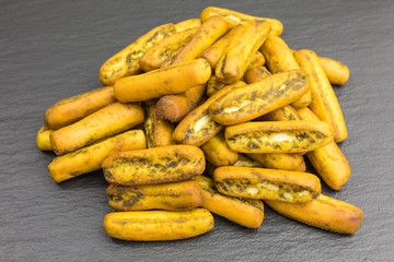 heap of mediterranean crunchy grissini with rosemary