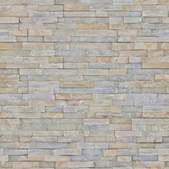 The lining on the wall imitation of natural stone for the facade