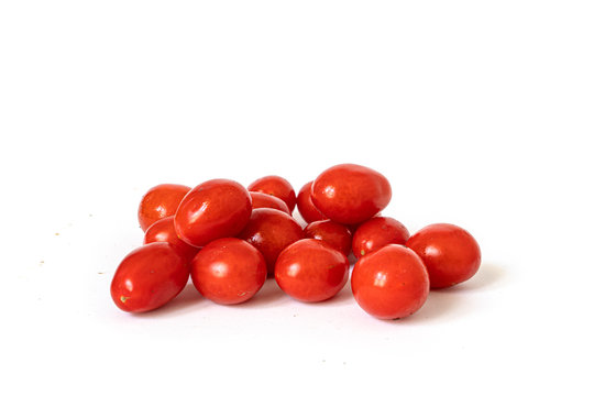 Sicilian typical "datterino" tomatoes isolated on a white background