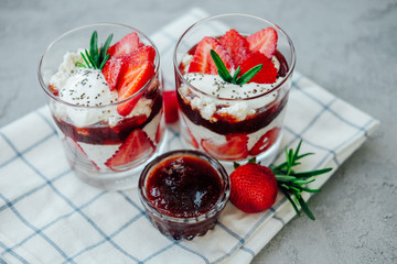 Sweet strawberry chia pudding dessert with cream and jelly