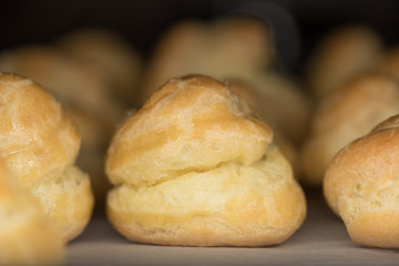 Baked Pate a Choux on Parchment Paper