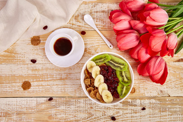 Coffee mug  and Bowl with Granola, pink tulip flowers