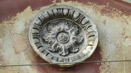 old round basrelief