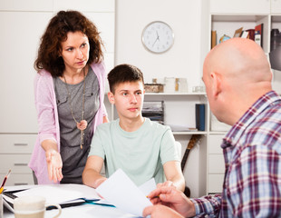 Fototapeta premium Family working with papers