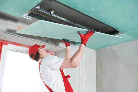 Gypsum Plasterboard Construction Work At Suspended Ceiling