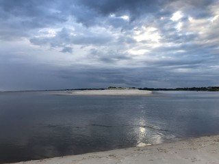 Sunset and reflections on the beach of Pinamar