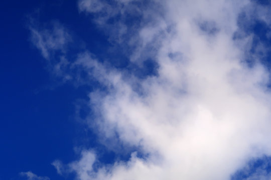 White fluffy cloud in a beautiful blue sky