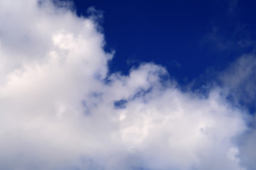 Large clouds across a blue sky