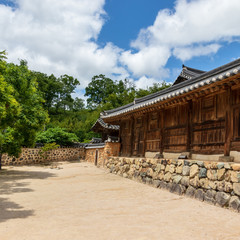 Detail view on korean traditional style building facade in the Yangdong Folk Village in a typical country side landscape. Gyeongju, South Korea.