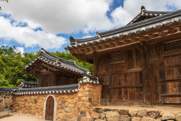 Korean traditional style building facade in Yangdong Folk Village in typical country side landscape. Gyeongju, South Korea, Asia.